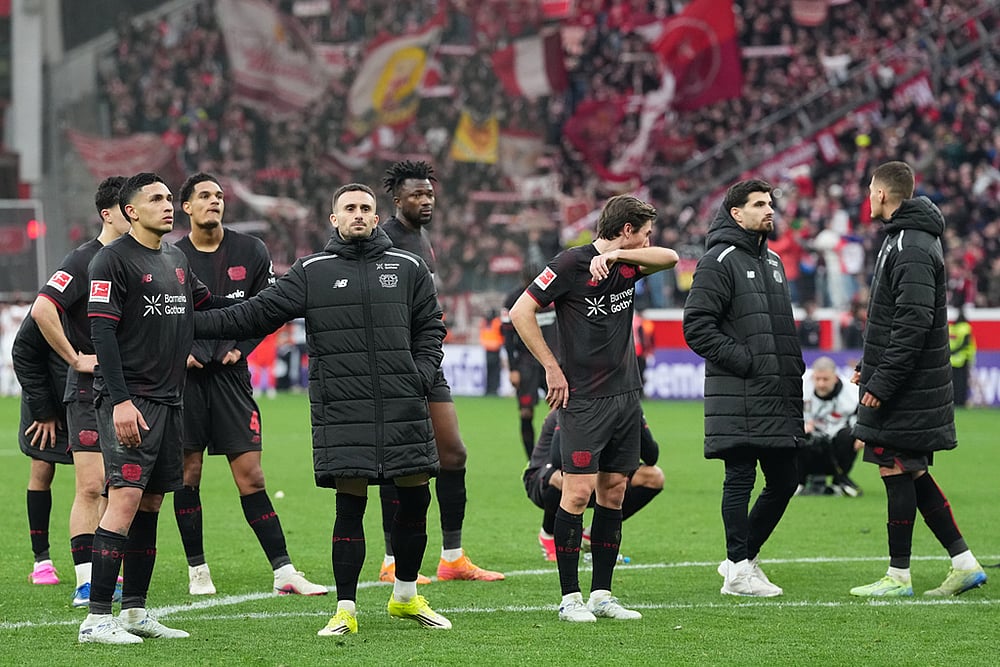 | Photo: AP/Martin Meissner : Leverkusen players react after the draw against Bayern Munich in a German Bundesliga soccer match, Leverkusen, Germany.