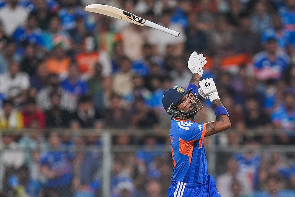| Photo: PTI/Kunal Patil : Indias Hardik Pandya loses his grip on the bat during the ICC Mens T20 World Cup 2026 second semifinal cricket match between India and England at Wankhede Stadium, in Mumbai.