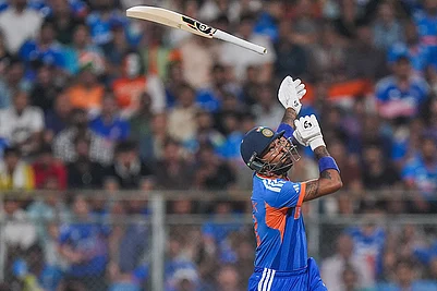 | Photo: PTI/Kunal Patil : Indias Hardik Pandya loses his grip on the bat during the ICC Mens T20 World Cup 2026 second semifinal cricket match between India and England at Wankhede Stadium, in Mumbai.