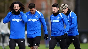 | Photo: AP/Ben Whitley : From left, Chelsea's Marc Cucurella, Enzo Fernandez, Pedro Neto and Alejandro Garnacho during a training session in Stoke d'Abernon, England, Monday, March 16, 2026, ahead of the Champions League soccer match against Paris Saint-Germain.