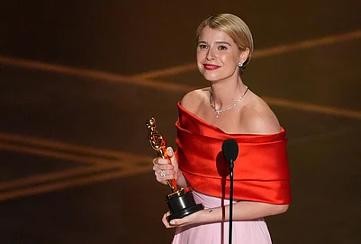 | Photo: AP/Chris Pizzello : Jessie Buckley accepts the award for actress in a leading role for Hamnet during the Oscars at the Dolby Theatre in Los Angeles.