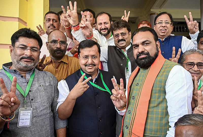 | Photo: PTI : Bihar Deputy Chief Minister Samrat Choudhary, right front, with BJP National President and NDA candidate Nitin Nabin, centre front, during voting in the Rajya Sabha polls, at Vidhan Sabha in Patna.