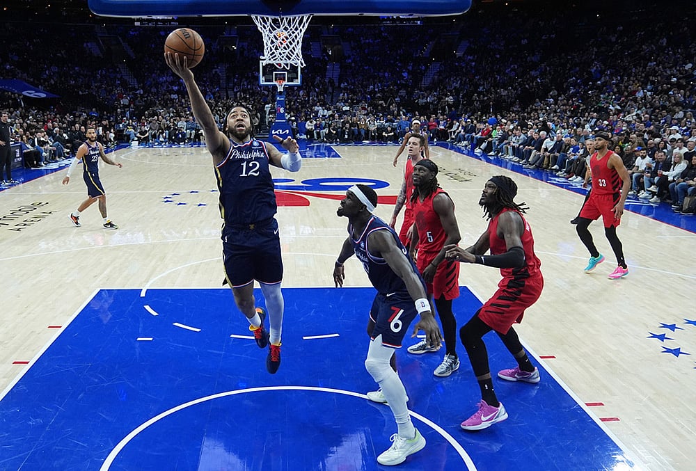 | Photo: AP/Matt Rourke : Philadelphia 76ers Trendon Watford (12) goes up to shoot during the first half of an NBA basketball game against the Portland Trail Blazers in Philadelphia. 