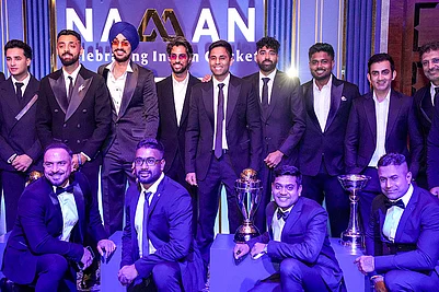 | Photo: PTI/Kamal Kishore : Indian mens cricket team captain Suryakumar Yadav with teammates during the BCCI Naman Awards 2026, in New Delhi.