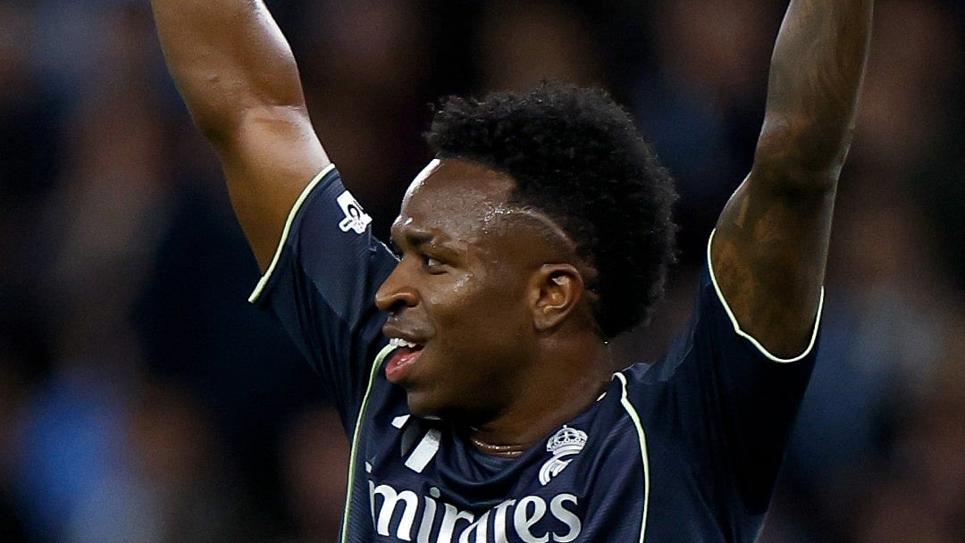 realmadrid/X : Vinicius Jr celebrates after scoring against Manchester City in the UEFA Champions League 2025-26 round of 16 clash. 