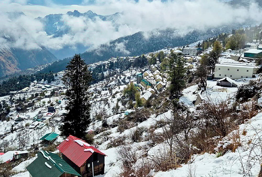 | Photo: PTI : A view of snow-capped mountains after fresh snowfall, in Chamoli, Uttarakhand.