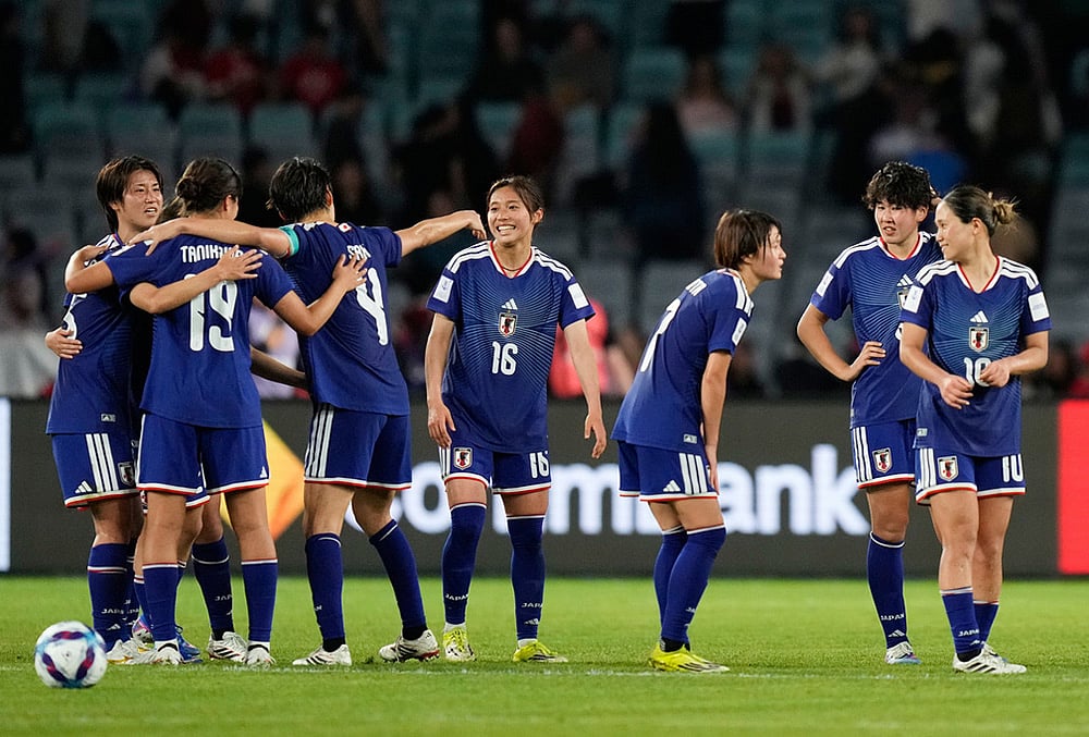 | Photo: AP/Rick Rycroft : Japan players celebrate following the Womens Asian Cup semifinal soccer match between Japan and South Korea in Sydney.