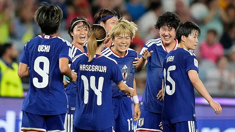 AP : Japan's Maika Hamano, centre, is congratulated by teammates after scoring her team's second goal during the AFC Women's Asian Cup semi-final between Japan and South Korea in Sydney.