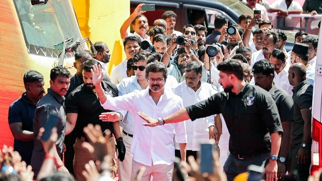|Representative Image : Tamilaga Vettri Kazhagam (TVK) President Vijay waves as he arrives for the public meeting in the Salem district, Tamil Nadu