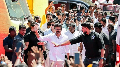 |Representative Image : Tamilaga Vettri Kazhagam (TVK) President Vijay waves as he arrives for the public meeting in the Salem district, Tamil Nadu