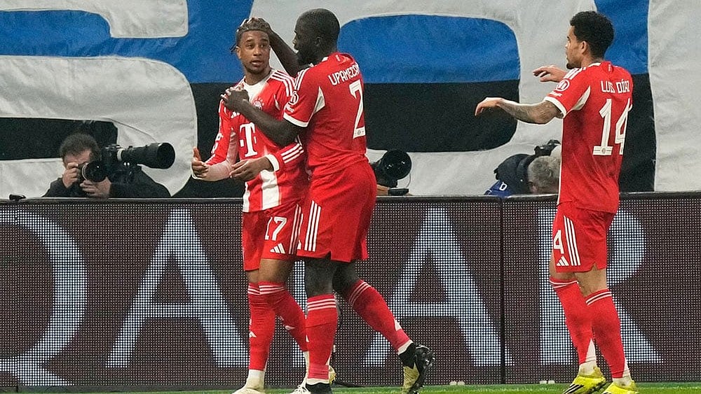 | Photo: AP/Luca Bruno : Bayern's Michael Olise (17) celebrates after scoring his side's second goal during the Champions League round of 16 soccer match between Atalanta and FC Bayern Munich in Bergamo, Italy.