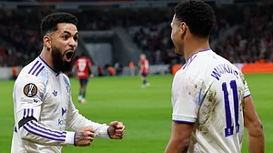 | Photo: AP/Jean-Francois Badias : Aston Villa's Douglas Luiz, left, and Ollie Watkins celebrate after a goal during a first leg, round of 16 Europa League soccer match between Lille and Aston Villa in Lille, France, Sunday, Feb. 22, 2026.