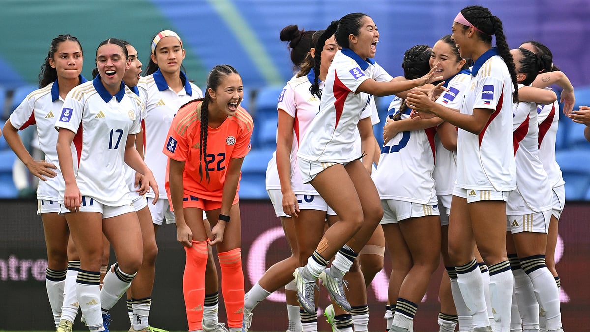 | Photo: AP/DAVE HUNT : Philippines players celebrate after defeating Uzbekistan in Women's Asian Cup qualifying match for the World Cup, at Gold Coast Stadium In Robina, Australia, Thursday, March 19, 2026.