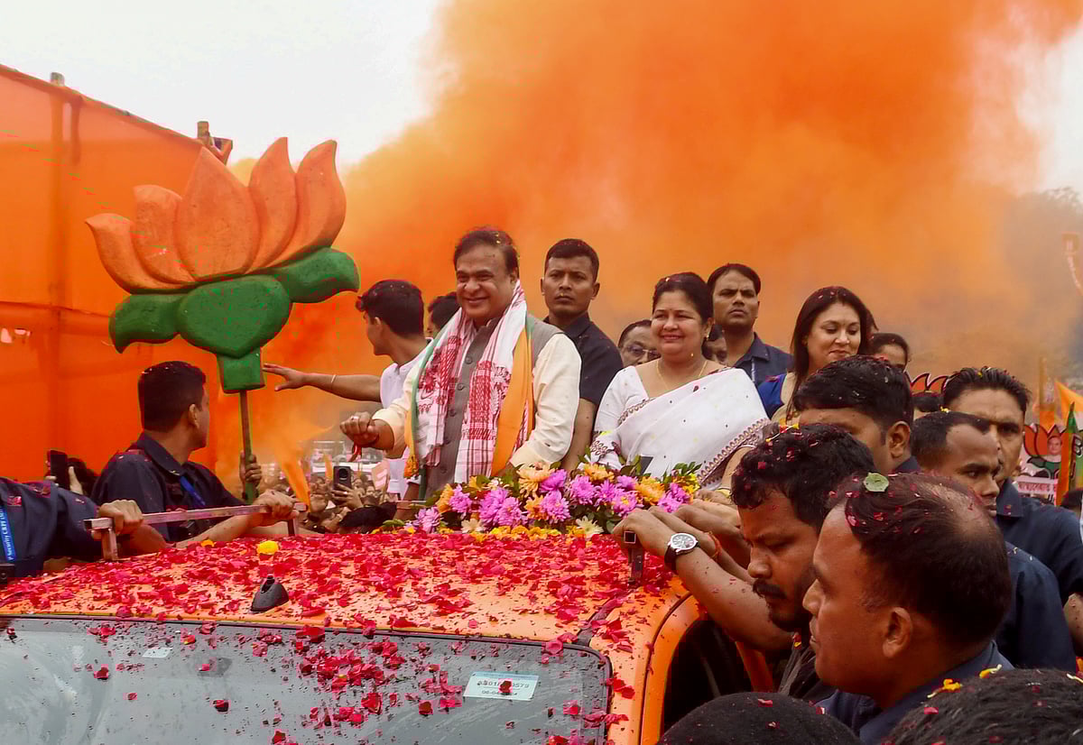 - : Assam Chief Minister Himanta Biswa Sarma takes part in a rally en route to file the nomination for the Jalukbari constituency ahead of the Assam Assembly elections, in Guwahati on Friday.