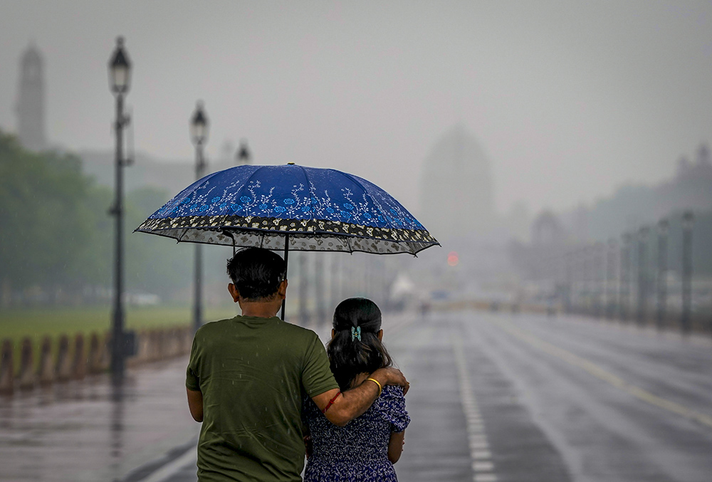 | Photo: PTI/Atul Yadav : Rainfall in Delhi - Representative image