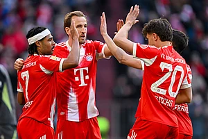 | Photo: Sven Hoppe/DPA via AP : From left, Munich's scorer Serge Gnabry, Harry Kane, Tom Bischof and Raphael Guerreiro celebrate their side's fourth goal during the German Bundesliga soccer match between FC Bayern Munich and 1. FC Union Berlin in Munich, Germany.