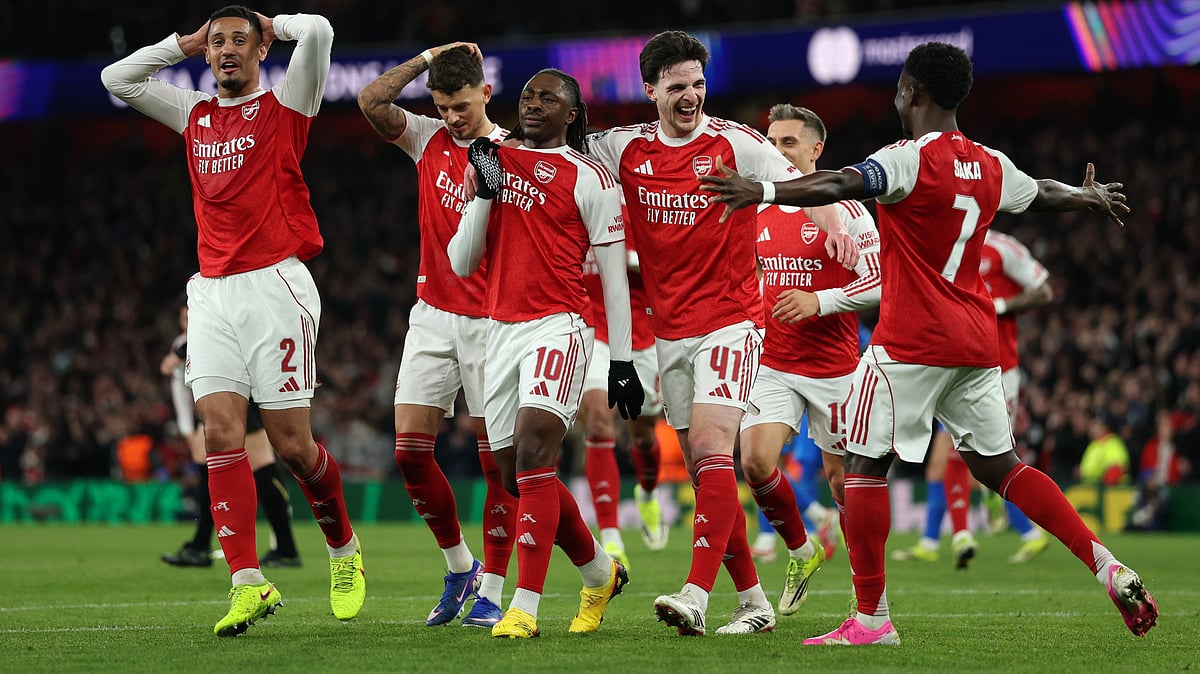 | Photo: AP/Ian Walton : Arsenals Eberechi Eze center, celebrates with teammates after scoring the opening goal during the second leg of the Champions League round of 16 soccer match between Arsenal and Bayer Leverkusen, in London, Tuesday, March 17, 2026. 