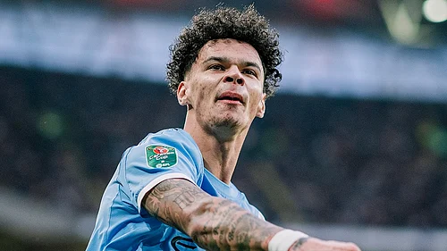 ManCity/X : Nico OReilly celebrates after scoring against Arsenal in EFL Cup 2025-26 Final at Wembley Stadium.