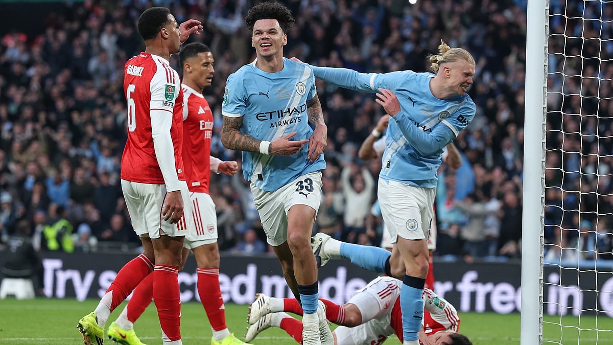 AP Photo  : Manchester City's Nico O'Reilly celebrates after scoring the opening goal during the English League Cup final soccer match between Arsenal and Manchester City in London, Sunday, March 22, 2026.
