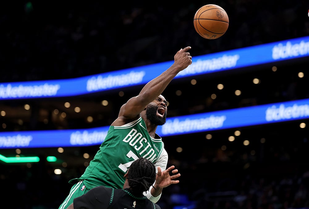 | Photo: AP/Mark Stockwell : Boston Celtics forward Jaylen Brown (7) throws to the net during the second half of an NBA basketball game against the Minnesota Timberwolves in Boston. 