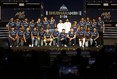 | Photo: PTI : Gujarat Titans skipper Shubman Gill with team players, GTs directors Shaan Mehta and Jinal Mehta, former England player and GT’s director of cricket Vikram Solanki and others pose for a group photograph during the franchises Shubharambh 2026 event featuring the squad, owners and partners, in Ahmedabad.