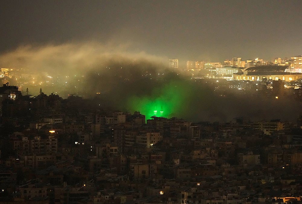 | Photo: AP/Hassan Ammar : Smoke rises from the site of an Israeli airstrike in Dahiyeh, Beiruts southern suburbs.