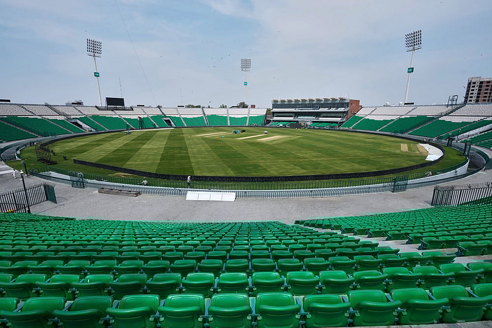| Photo: AP/K.M. Chaudary : Groundsmen work at the at the Gaddafi Stadium in preparations for upcoming Pakistans premier domestic T20 the Pakistan Super League, which will take place in empty stadiums due to the recent spike in oil prices, in Lahore, Pakistan.