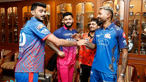 X/Indian Premier League : Indian Premier League team captains (from left) Axar Patel (Delhi Capitals), Riyan Parag (Rajasthan Royals), Ishan Kishan (Sunrisers Hyderabad, interim) and Hardik Pandya (Mumbai Indians) interact in Mumbai ahead of the meeting with the Board of Control for Cricket in India.