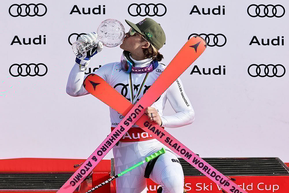 | Photo: AP/Marco Trovati : Brazils Lucas Pinheiro Braathen holds the globe trophy for the alpine ski, mens giant slalom discipline title, at the Lillehammer World Cup Finals, in Hafjell, Norway.