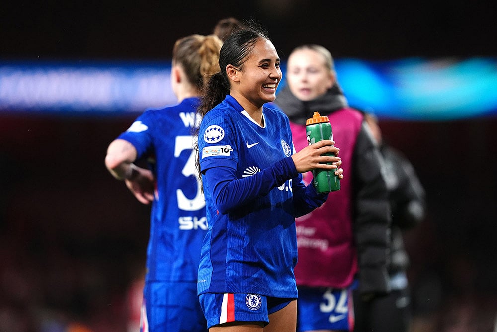 | Photo: John Walton/PA via AP : Chelsea's Alyssa Thompson smiles after the Women's Champions League soccer match between Arsenal and Chelsea in London.