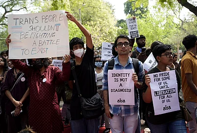 | Photo: Vikram Sharma/Outlook : Supporters of the LGBTQIA+ community hold placards during a protest against the passage of the Transgender Persons (Protection of Rights) Amendment Bill, 2026, at Jantar Mantar in New Delhi.