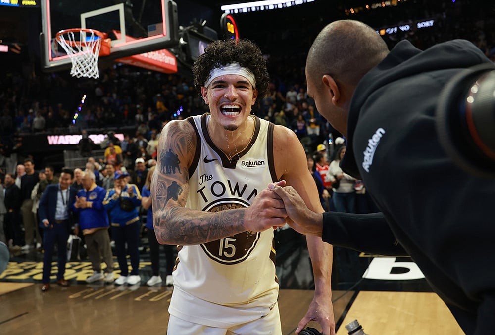 | Photo: AP/Jed Jacobsohn : Golden State Warriors forward Gui Santos (15) celebrates with teammate Al Horford, right, after an NBA basketball game against the Brooklyn Nets in San Francisco.