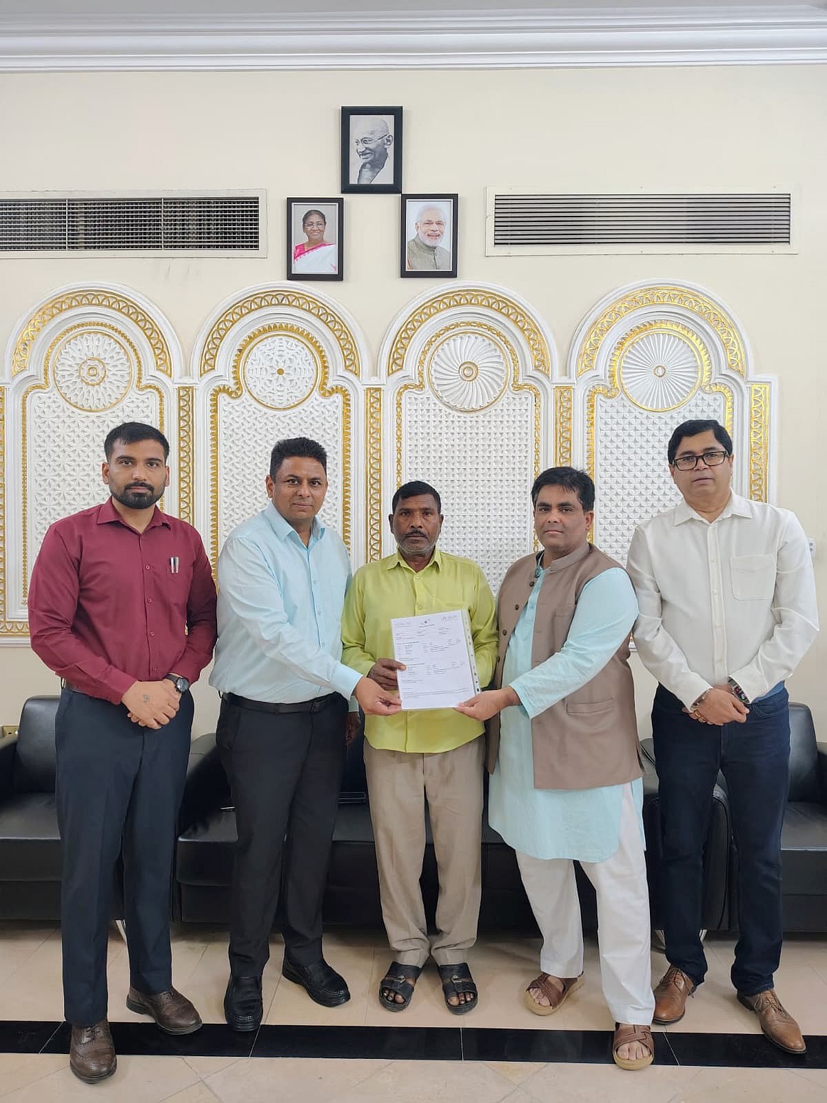 Rajendra Chauhan with members who helped him return to India