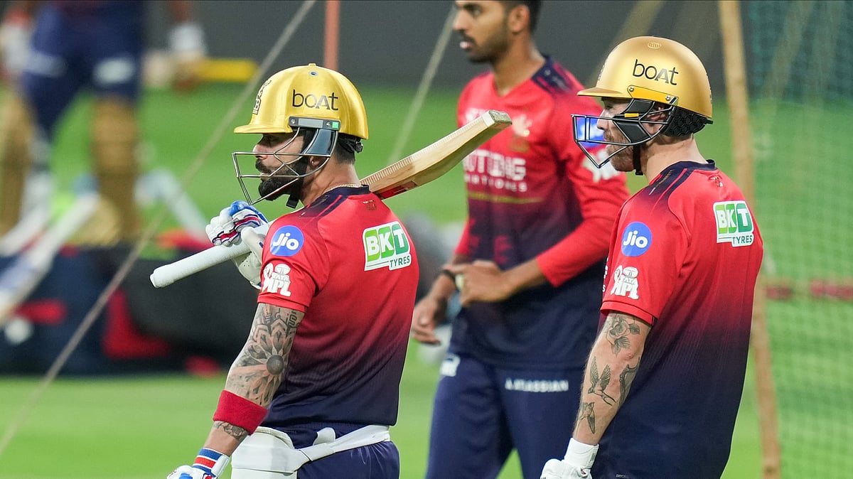 PTI/Shailendra Bhojak : Royal Challengers Bengalurus Virat Kohli, left, and Phil Salt, right, during a practice session ahead of their Indian Premier League 2026 match against Sunrisers Hyderabad, at M. Chinnaswamy Stadium in Bengaluru.