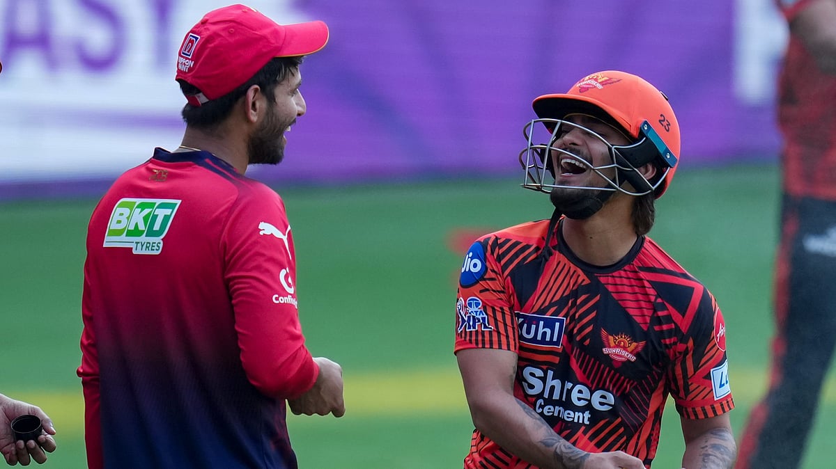 PTI/Shailendra Bhojak : SunRisers Hyderabads captain Ishan Kishan, right, with Royal Challengers Bengalurus Jitesh Sharma during a practice session on the eve of their Indian Premier League 2026 match at M Chinnaswamy Stadium in Bengaluru.