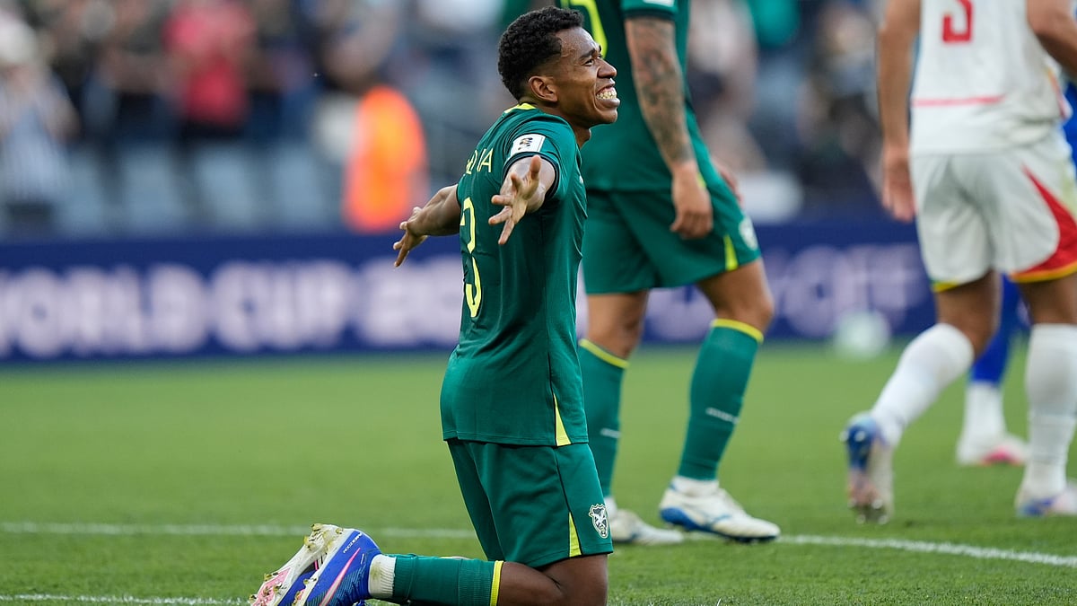 | Photo: AP/Fernando Llano : Bolivia's Diego Medina celebrates at the end of a World Cup playoff semifinal soccer match between Bolivia and Suriname in Monterrey, Mexico, Thursday, March 26, 2026. 