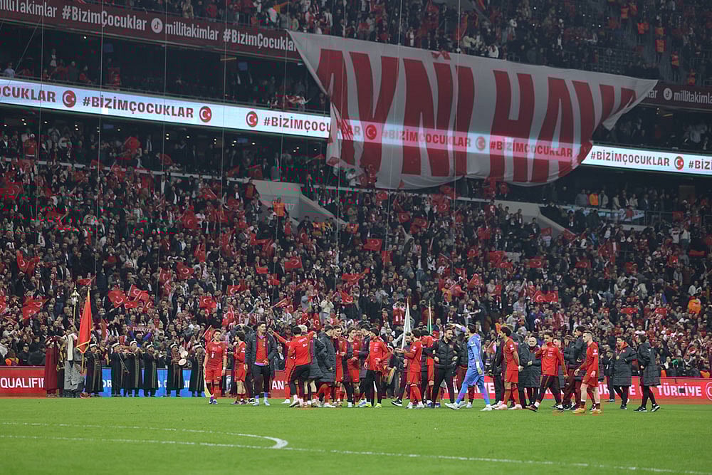 | Photo: AP  : Turkeys players celebrate at the end of the 2026 World Cup playoff semifinal soccer match between Turkey and Romania, in Istanbul, Turkey.