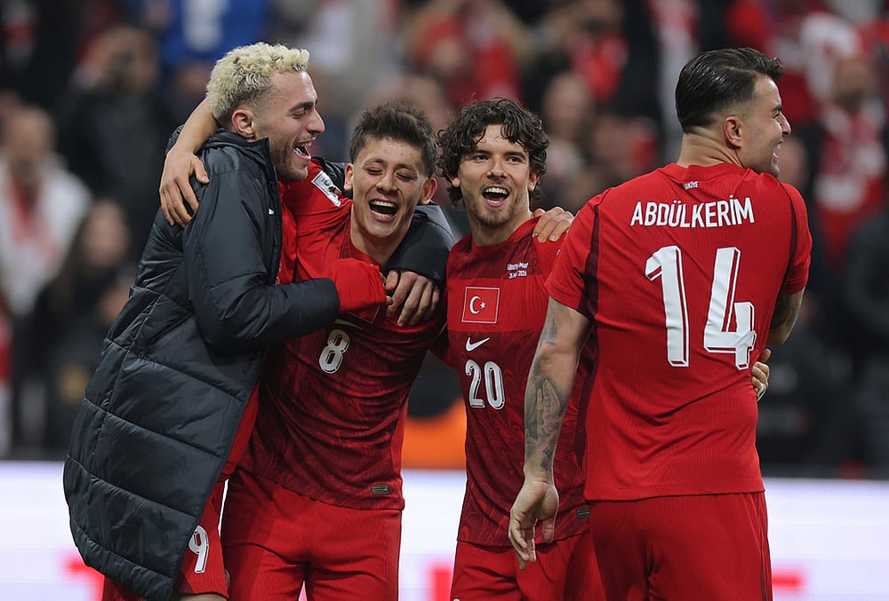 | Photo: AP : Turkeys players celebrate at the end of the 2026 World Cup playoff semifinal soccer match between Turkey and Romania, in Istanbul, Turkey.