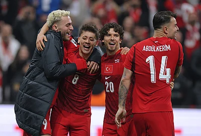 | Photo: AP : Turkeys players celebrate at the end of the 2026 World Cup playoff semifinal soccer match between Turkey and Romania, in Istanbul, Turkey.