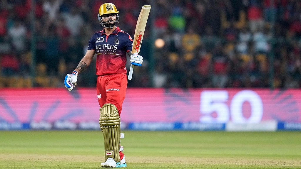 AP : Royal Challengers Bengalurus Virat Kohli celebrates his fifty runs during their Indian Premier League match against Sunrisers Hyderabad in Bengaluru.