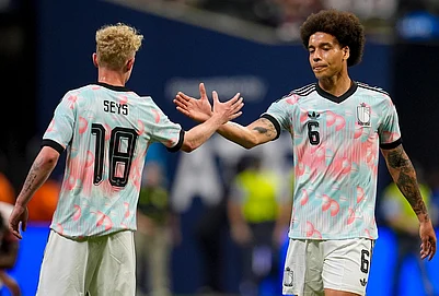 | Photo: AP/Mike Stewart : Belgiums Joaquin Seys (18) and Axel Witsel celebrate after defeating the United States in an international friendly soccer match in Atlanta.