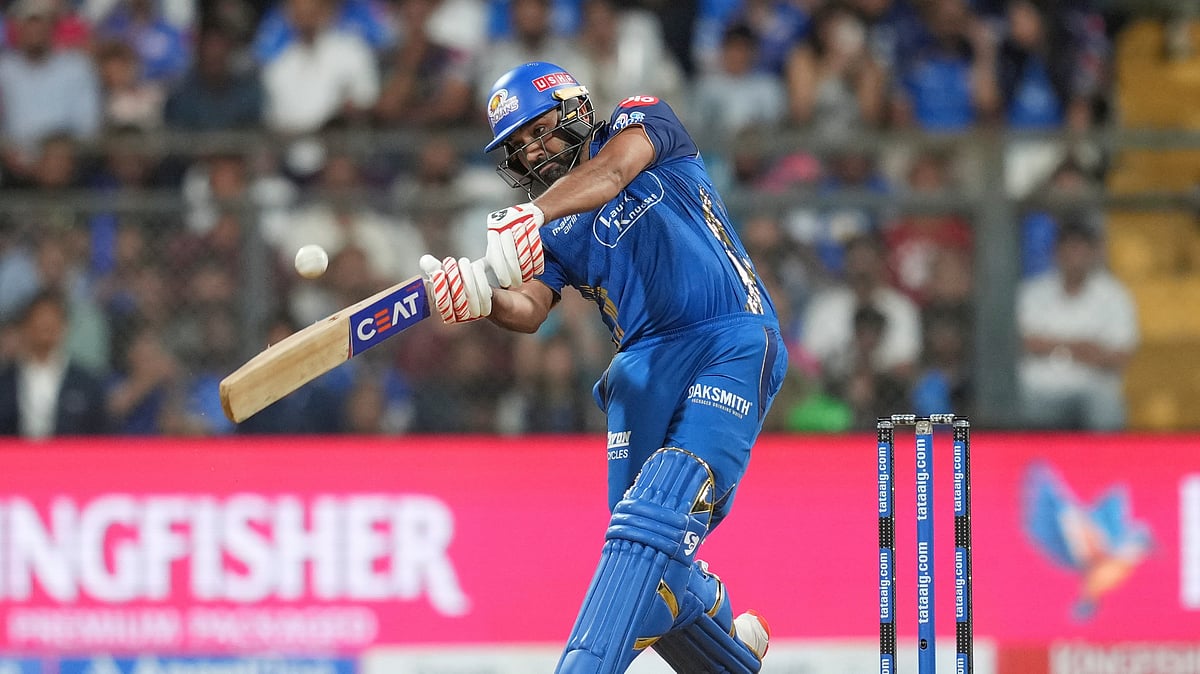 (AP Photo/Rafiq Maqbool) : Mumbai Indians Rohit Sharma plays a shot during the Indian Premier League cricket match between Mumbai Indians and Kolkata Knight Riders in Mumbai, India, Sunday, March 29, 2026.