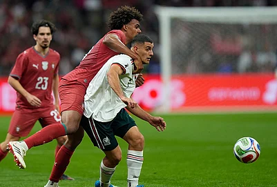 | Photo: AP/Fernando Llano : Mexicos German Berterame, right, is challenged by Portugals Renato Veiga during the international friendly soccer match between Mexico and Portugal in Mexico City.