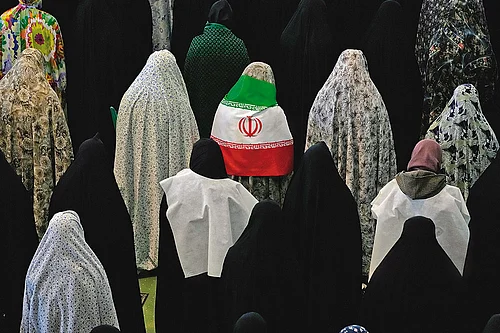 | Photo: AP : Call to Prayer: Iranian worshippers perform Eid al-Fitr prayers in Tehran on March 21, 2026