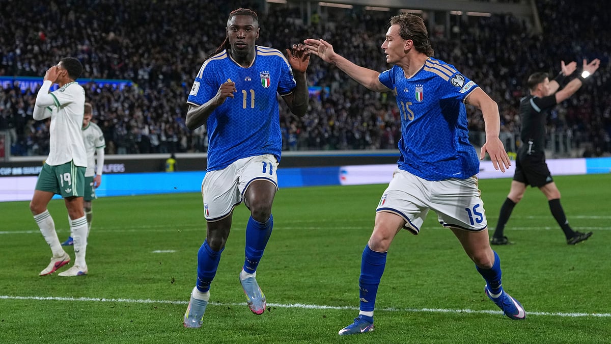 | Photo: AP/Antonio Calanni : Italy's Francesco Pio Esposito, right, celebrates with Moise Kean who scored his side's second goal during the World Cup qualifying play-off soccer match between Italy and Northern Ireland, in Bergamo, Italy, Thursday, March 26, 2026.