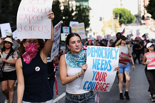 Source: AP
: Demonstrators march through downtown Los Angeles during a No Kings protest Saturday, March 28, 2026. (AP Photo/Jill Connelly)