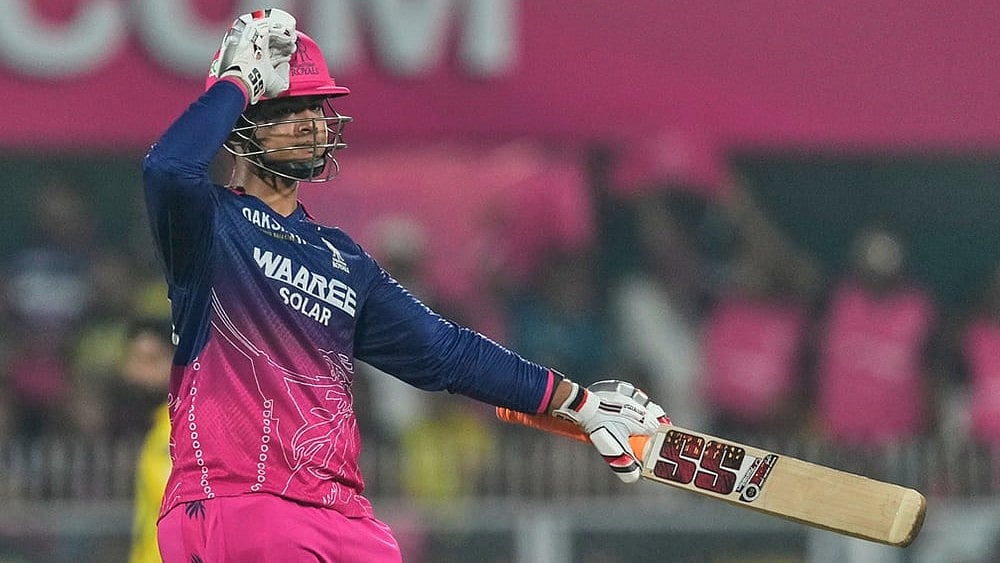 | Photo: AP/Anupam Nath : Rajasthan Royals Vaibhav Sooryavanshi celebrates his fifty runs during the Indian Premier League cricket match between Chennai Super Kings and Rajasthan Royals in Guwahati.