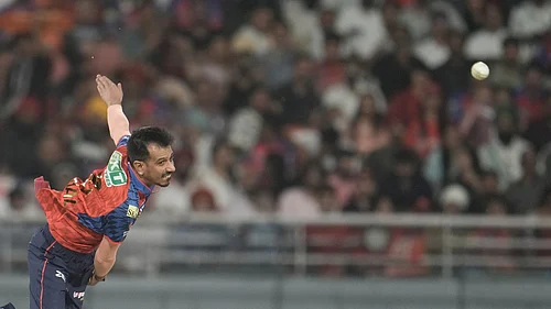 AP Photo : Punjab Kings Yuzvendra Chahal bowls a delivery during the Indian Premier League cricket match between Gujarat Titans and Punjab Kings in New Chandigarh, India, Tuesday, March 31, 2026.