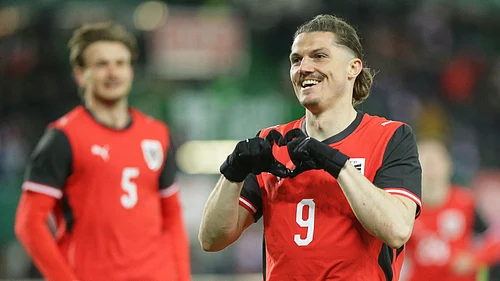 AP Photo/Heinz-Peter Bader : Austrias Marcel Sabitzer celebrates after scoring his sides opening goal during the international friendly soccer match between Austria and South Korea in Vienna, Austria, Tuesday, March 31, 2026.