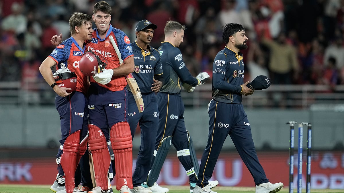 (AP Photo/Ashwini Bhatia) : Punjab Kings Cooper Connolly, left, and Xavier Bartlett celebrate after winning the Indian Premier League cricket match against Gujarat Titans in New Chandigarh, India, Tuesday, March 31, 2026